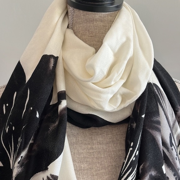 Lightweight scarf/wrap.  Cream and black with floral details.  Fringe on the end - Picture 2 of 5